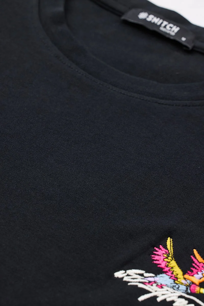 سنيتش تيشيرت أسود بطبعة جرافيك بقصة واسعة